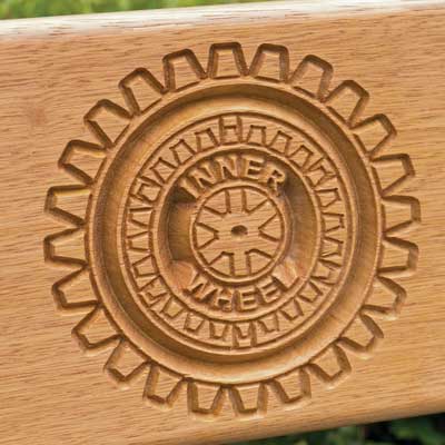 Carved inner wheel logo